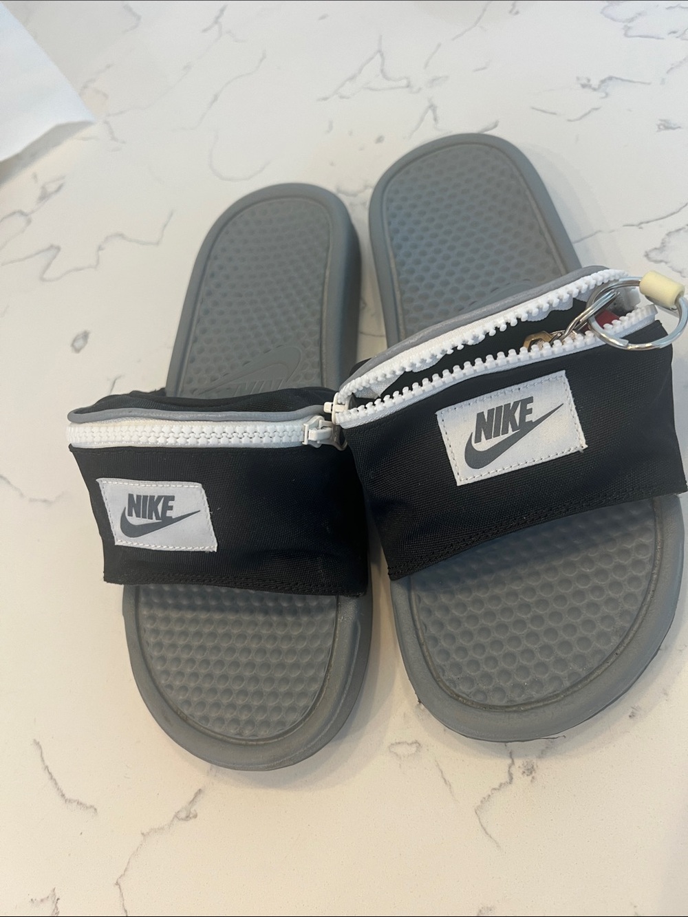 Nike Grey Slides with Black Zipper Pouch and White Accents